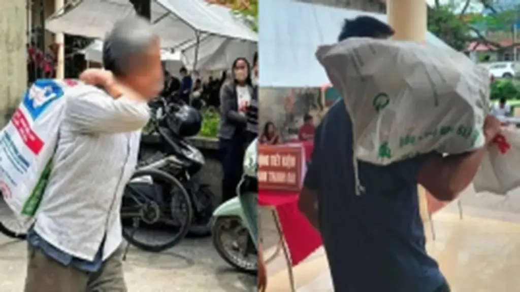 Người dân vác bao tải đi đựng tiền đền bù đất siêu dự án Olympic