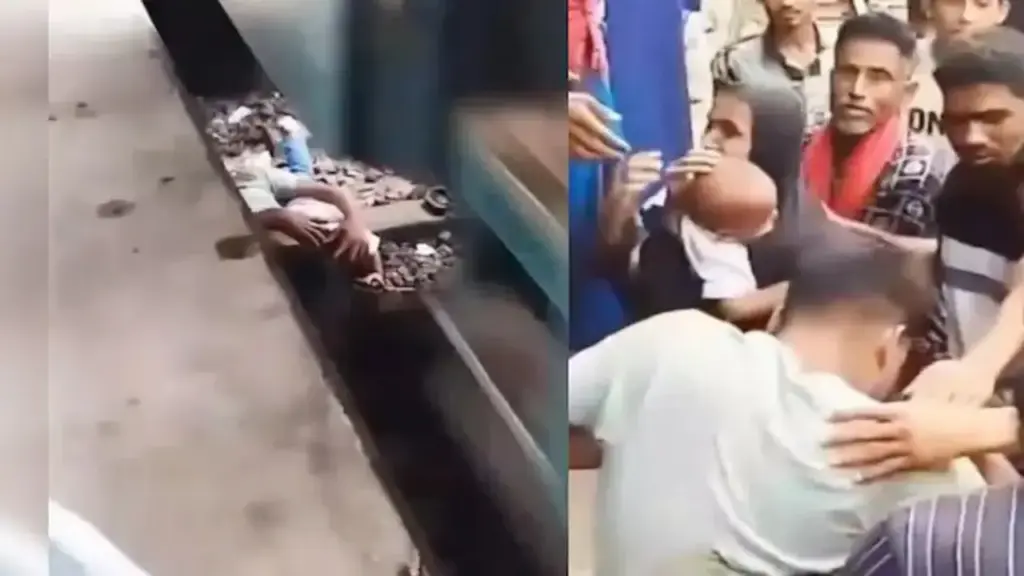 Thót tim khoảnh khắc 2 cha con thoát chết sau khi 8 toa tàu chạy phía trên