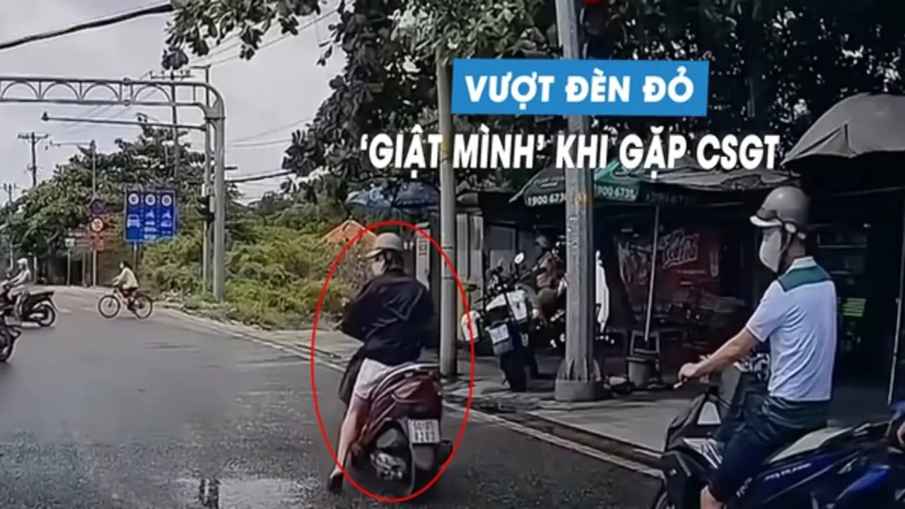 Thanh niên lái xe máy vượt đèn đỏ, 'hết hồn' phanh gấp khi thấy CSGT