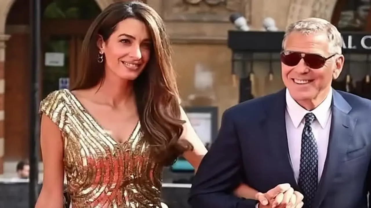Vợ chồng George Clooney dự sự kiện của vua Charles III