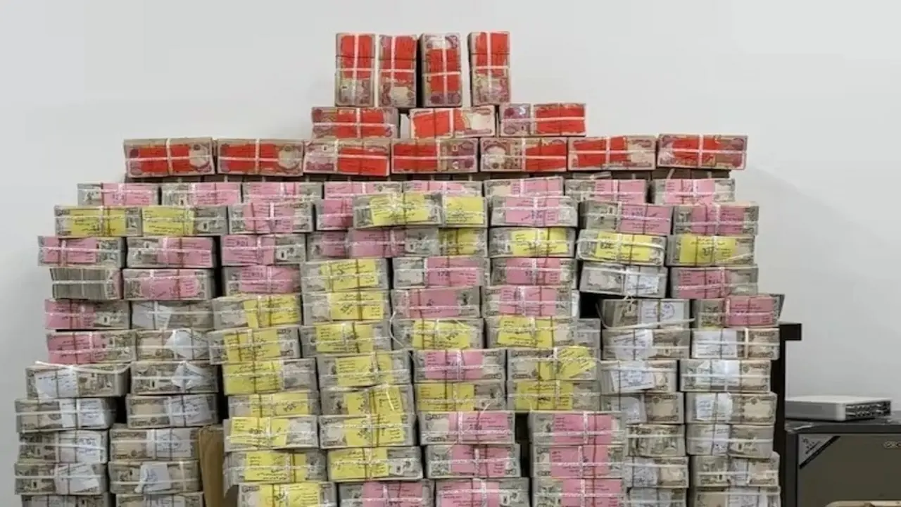 Iraq thu 20 triệu USD, 5kg vàng giấu trong chai nước ở nhà cựu quan chức