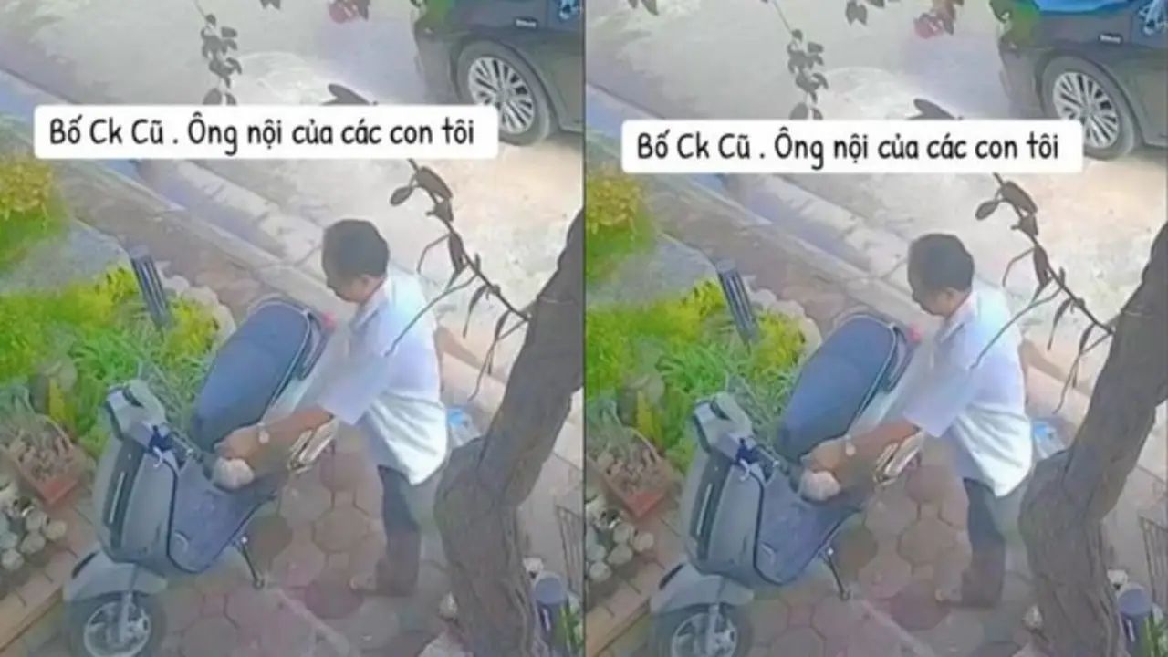Phía sau clip người đàn ông lớn tuổi lặng lẽ treo túi đồ ăn ở xe